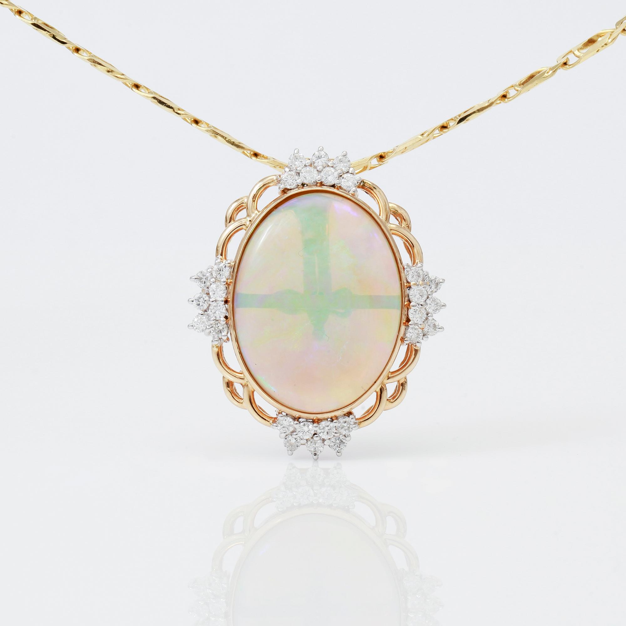 HÄNGE MED KEDJA, opal samt briljanter totalt ca 0,70 ct.