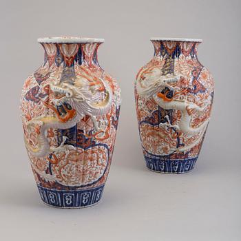 A pair of Japanese porcelain vases, 19th Century.