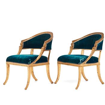 64. A pair of late Gustavian armchairs by Ephraim Ståhl (master in Stockholm 1794-1820).