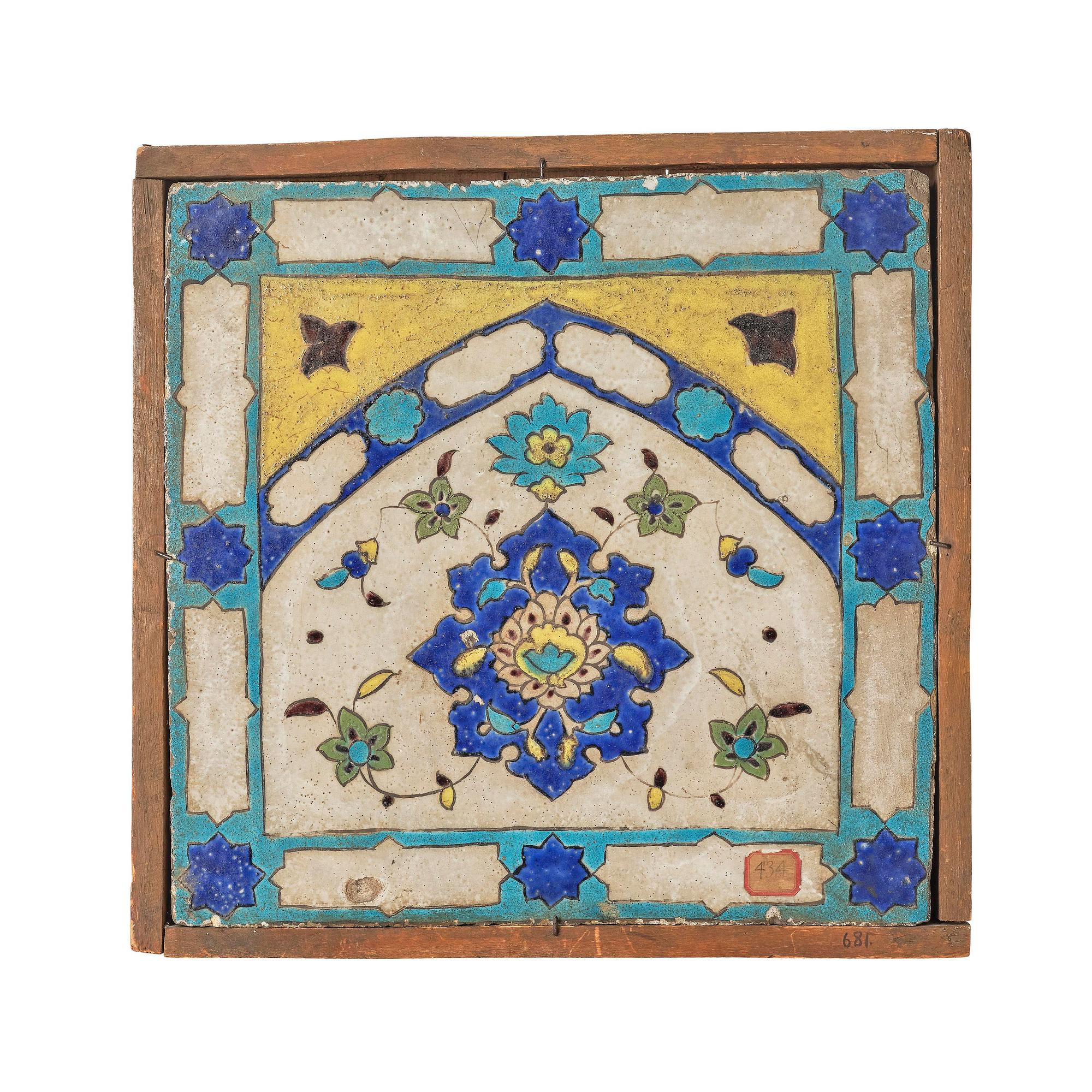 A 'cuerda seca' pottery tile, c. 39 x 40 cm (with mounting 44 x 44 cm), Persia (Iran), the Qajar dynasty (1789–1925).
