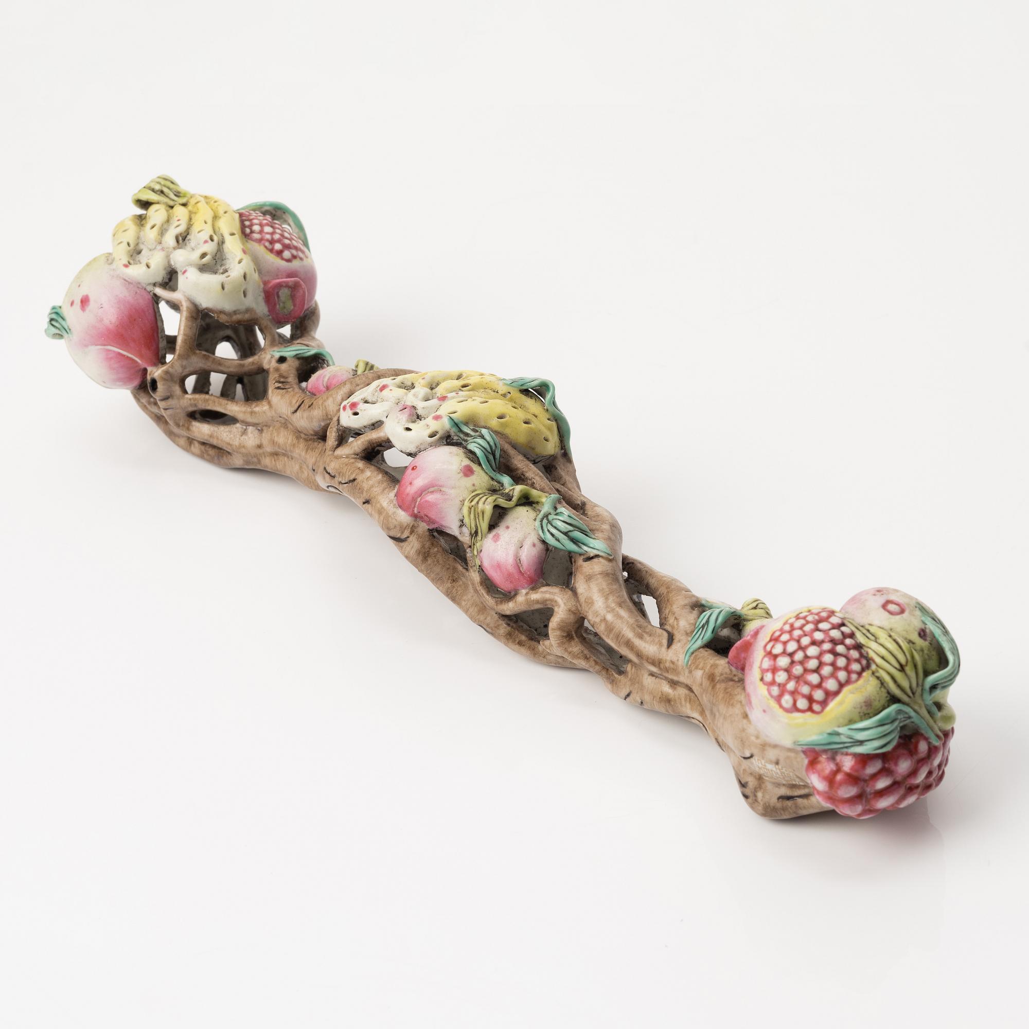 A Chinese porcelain ruyi-sceptre, late 20th century.