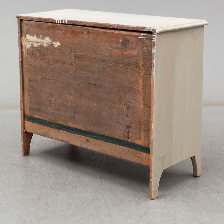 A mid 19th century painted chest of drawers.