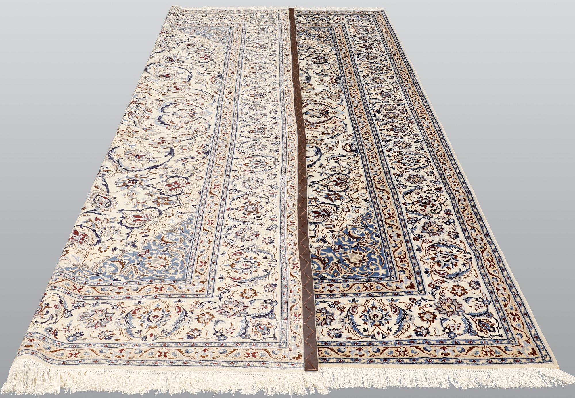A carpet, Nain part silk so called 9LAA, ca 375 x 244 cm.