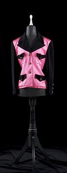 1240. A 21th cent black velvet and cerise silk jacket by Chanel.