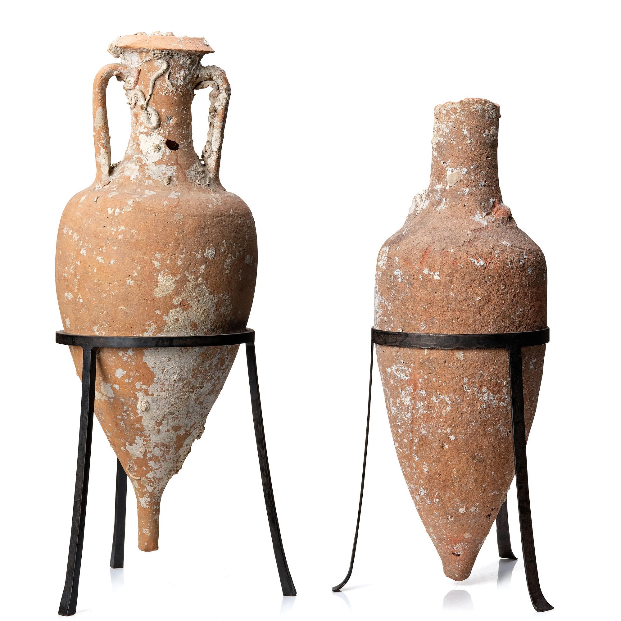 Two pottery Mediterranean presumably Roman time amphoras.