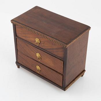 An Empire mahogany miniature commode, 19th Century.