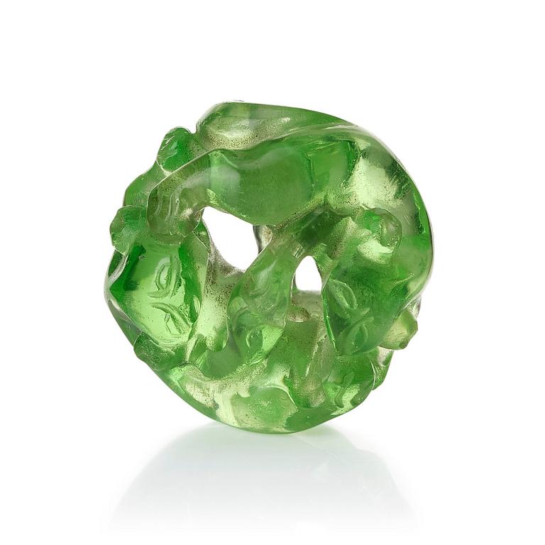 A green sculptured bead, Qing dynasty.