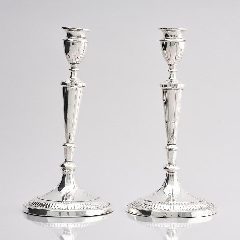 A pair of 18th century silver candlesticks, marks of John Parson & Co, Sheffield 1791.