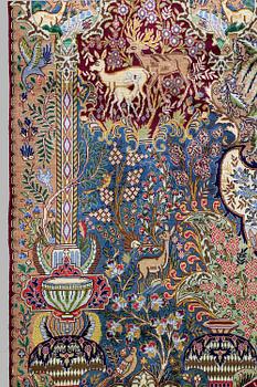 A Kashmar figural carpet. Circa 390 x 300 cm.