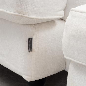 An armchair with a foot stool, Furninova, 21st Century.