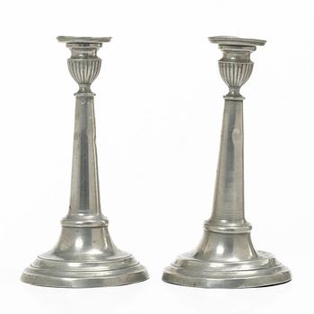 A pair of pewter candle sticks, Sweden, possibly 1844.