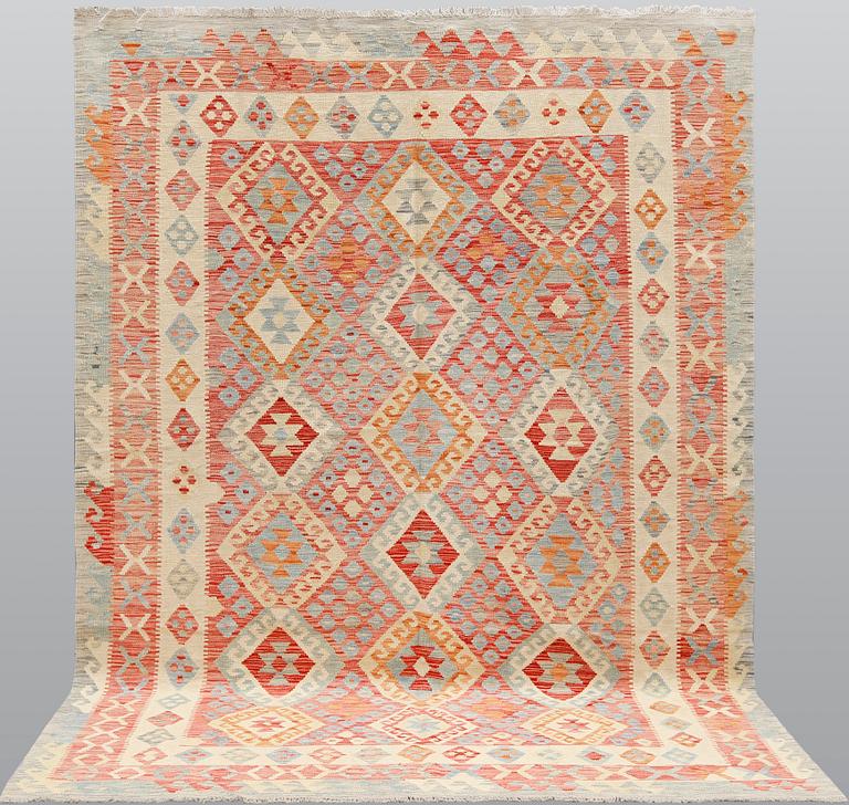 A carpet Kilim, ca 290 x 214 cm.