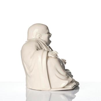 A blanc de chine figure of Budai, Qing dynasty, 18/19th century.
