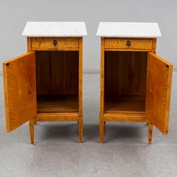 A pair of bedside tables from the first half of the 20th century.