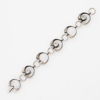 Karl Laine, ring, pendant, and bracelet, silver with rock crystal.