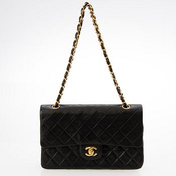 A Black Double Flap Bag.