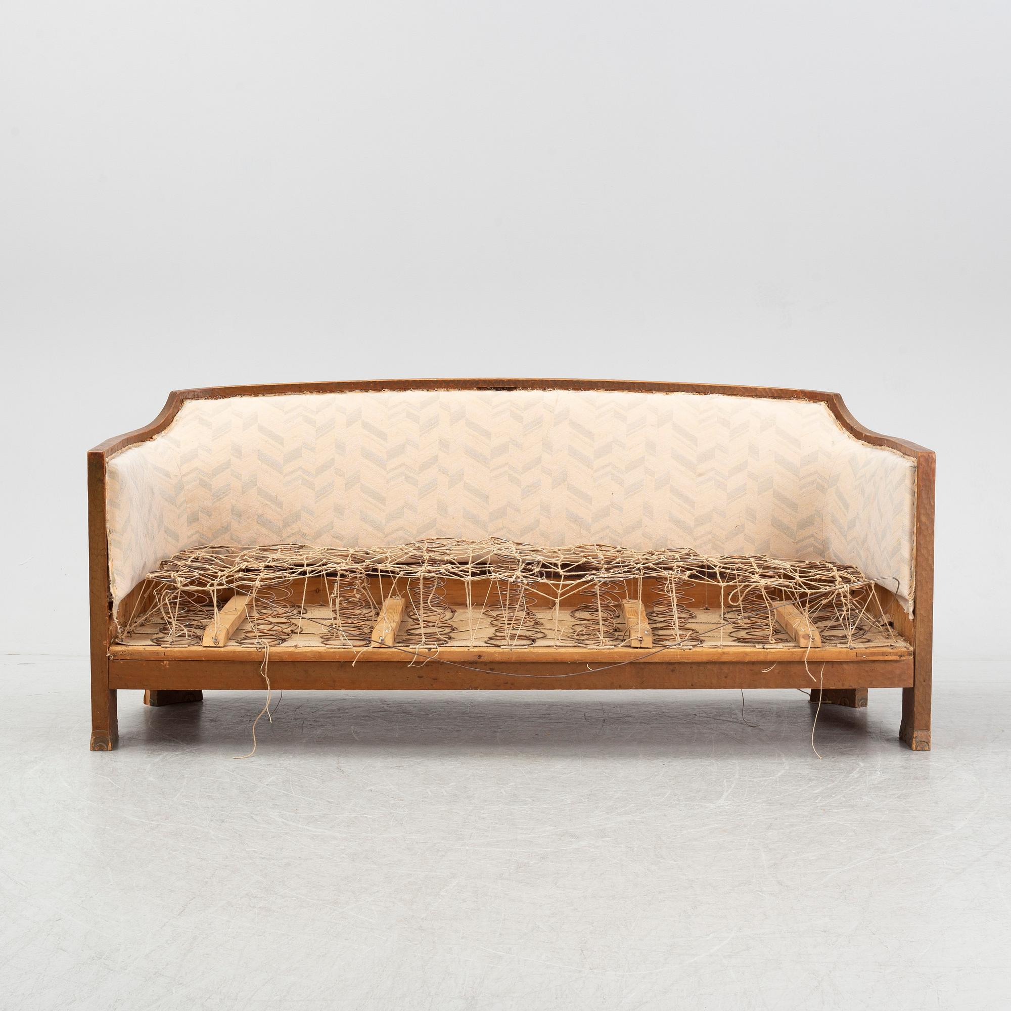 Otto Wretling, attributed to, an Art Nouveau pine sofa, Sweden early 20thC.