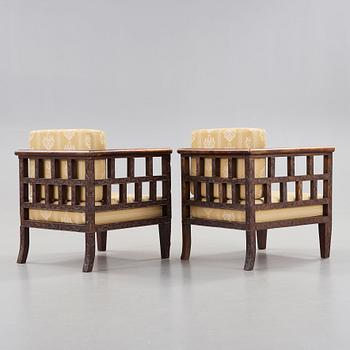 A pair of Chinese arm-chairs, 1920's.