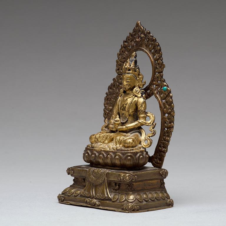 A cold gilt copper alloy figure of Amithayus, Tibet, 18th/19th Century.