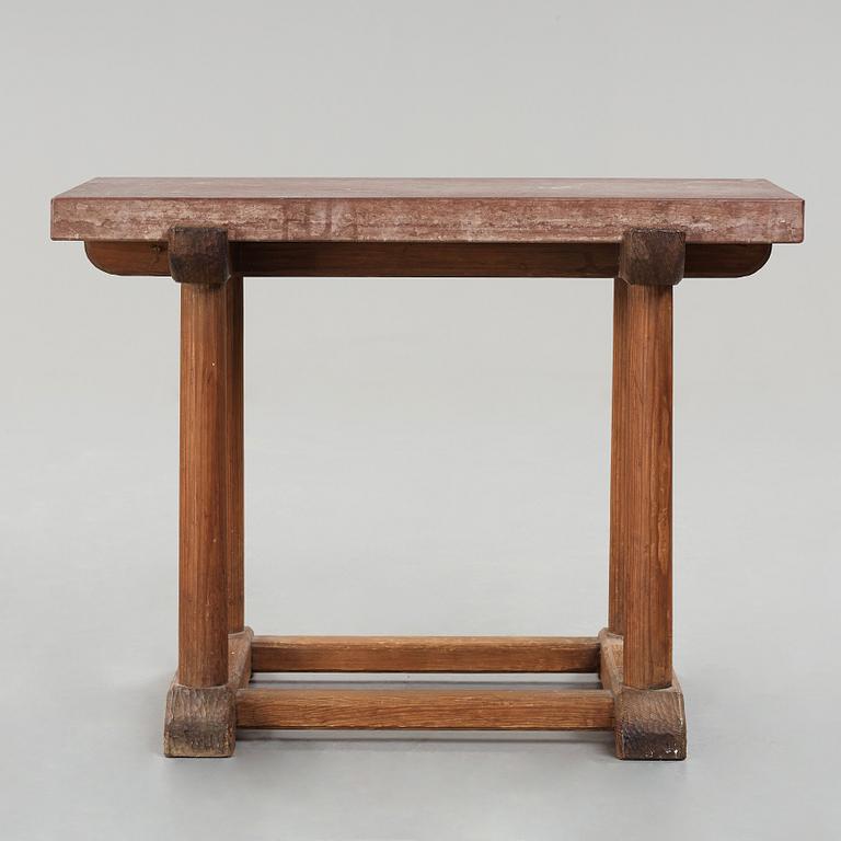 Axel Einar Hjorth, a red limestone top and stained pine side table, Nordiska Kompaniet, Sweden 1929.