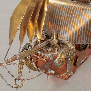 A boat sculpture, dated -75.