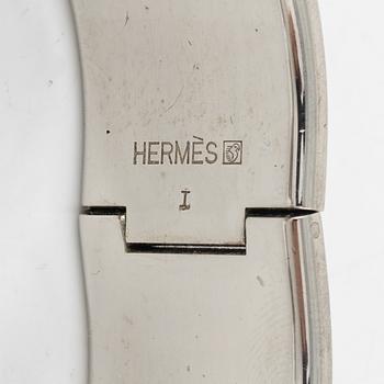 Hermès, a 'Clic Clac H' bracelet.
