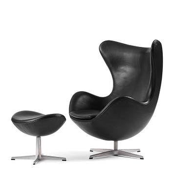 77. Arne Jacobsen, an "Egg" armchair with ottoman, Fritz Hansen, Denmark, 2001.