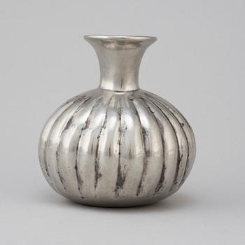 A pewter vase from Firma Svenskt Tenn 1974.