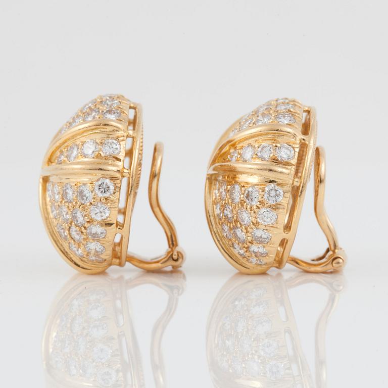 A pair of brilliant-cut diamond earrings. Diamond total carat weight circa 3.50 cts.  Signed Harry Winston.