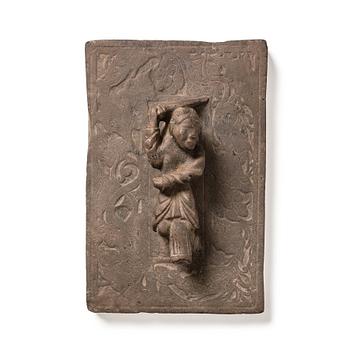 1129. A heavy stone slate/press, presumably Ming dynasty (1368-1644).