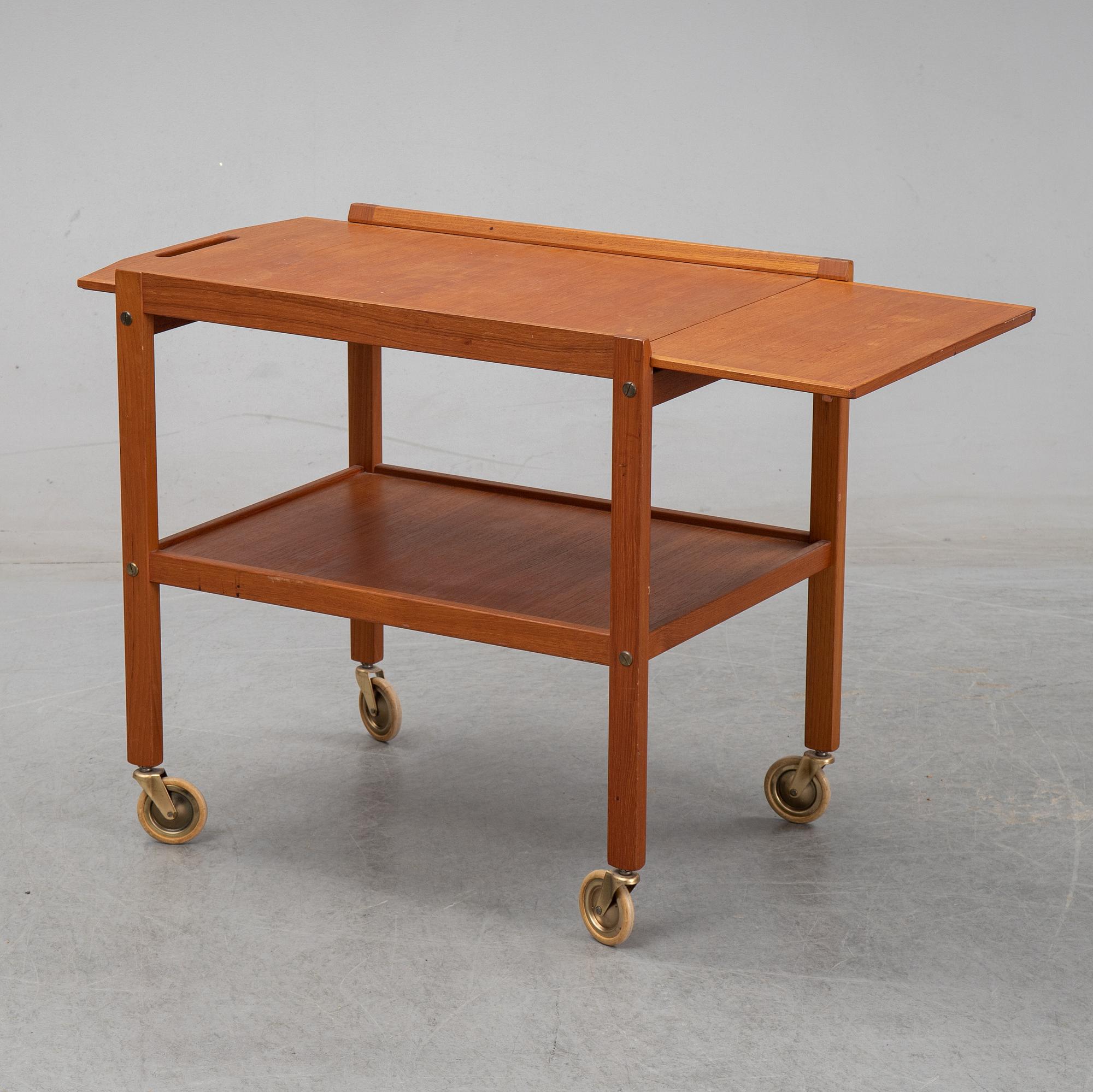 a mid 20th century teak serving trolley.