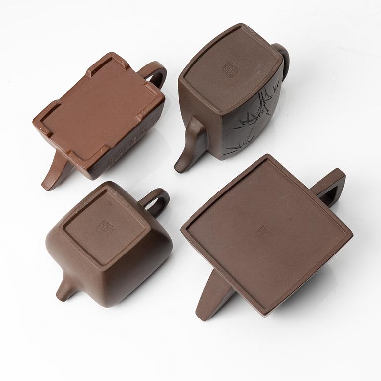 A group of four square yixing teapots, China, 1970/80s.
