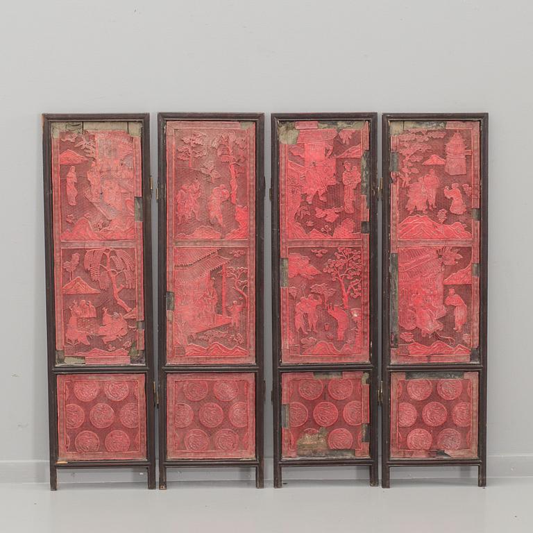 A four panel lacquer screen, Qing dynasty, 19th Century.