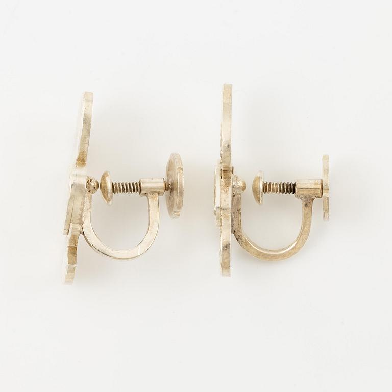 Wiwen Nilsson, a pair of earrings, silver, in the form of flowers, Lund 1952 and 1953.