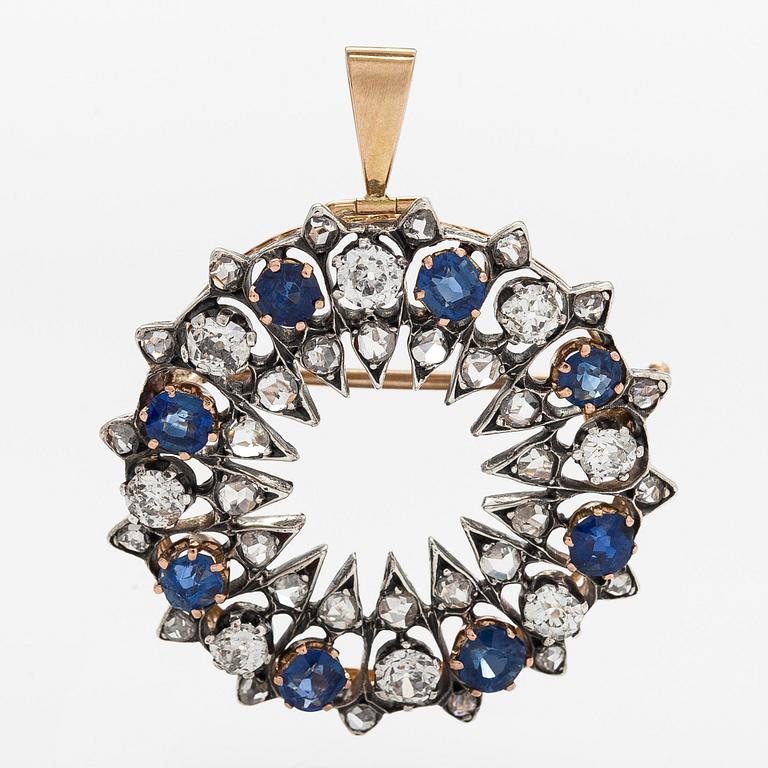 Brooch/pendant, ca 16K gold, set with sapphires, old mine and rose-cut diamonds.