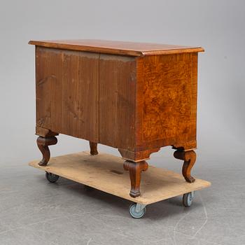 A mid 18th Century late Baroque chest of drawers.