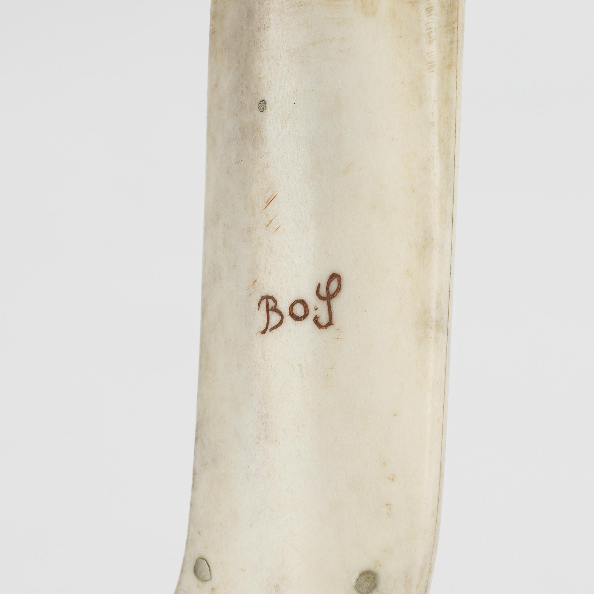 A reindeer horn knife by Bo Sunna, signed.