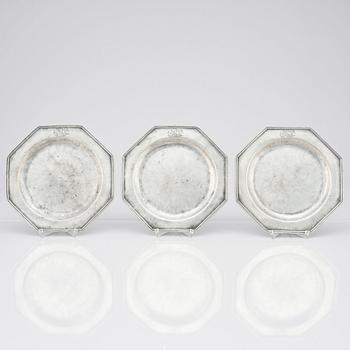 A set of six George II octagonal pewter plates by George Bacon of London mid 18th century.