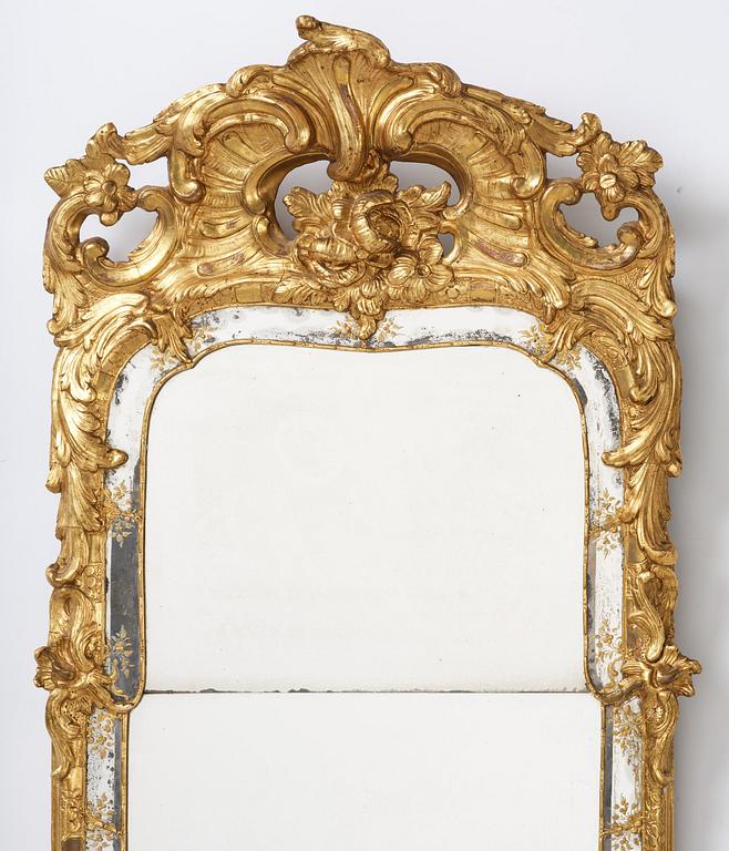 A giltwood rococo mirror, Stockholm, later part 18th century.