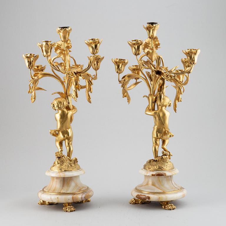A pair of mid 19th century ormolu and onyx candelabra.
