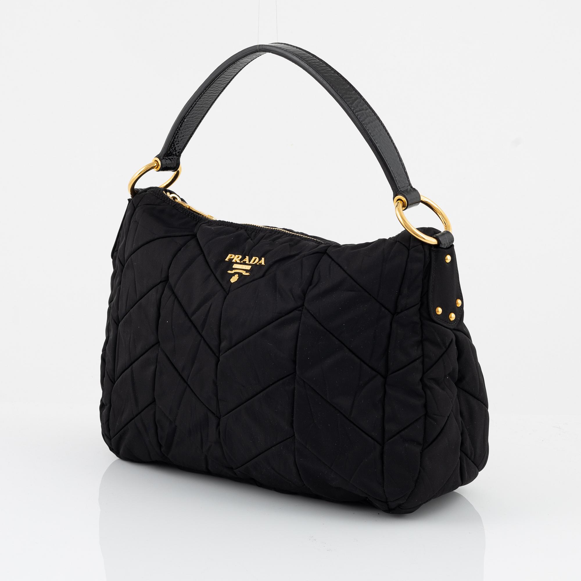 Prada, a black nylon bag.