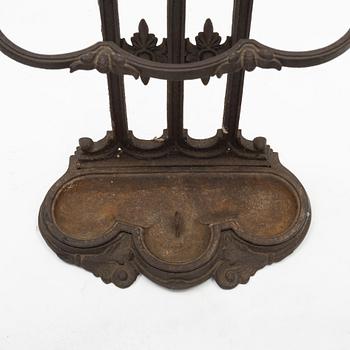 A cast iron umbrella stand, circa 1900.
