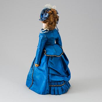 A bisque head fashion doll, probably France, late 19th century.