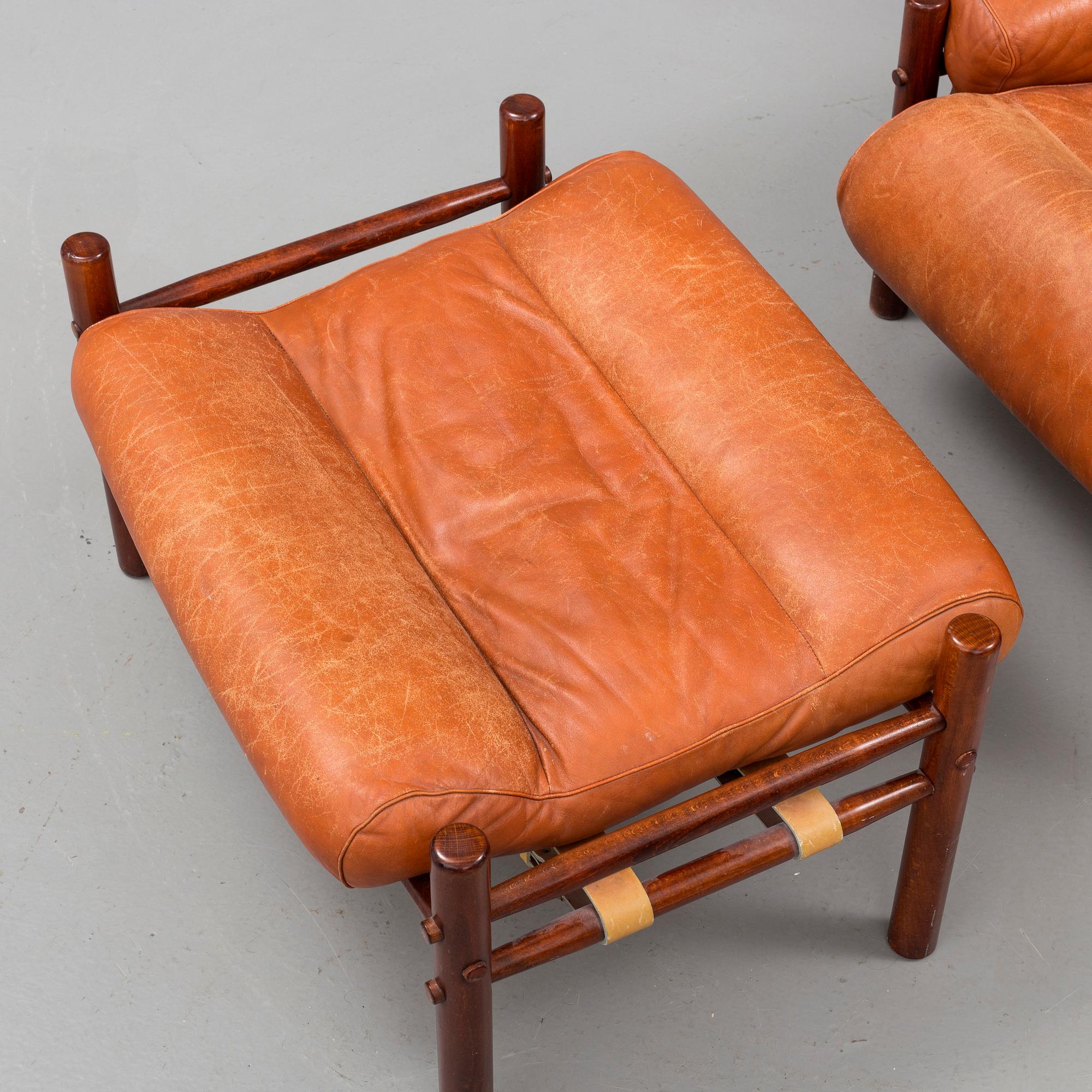A 1960/70's 'Inca' easy chair and a foot stool by Arne Norell.
