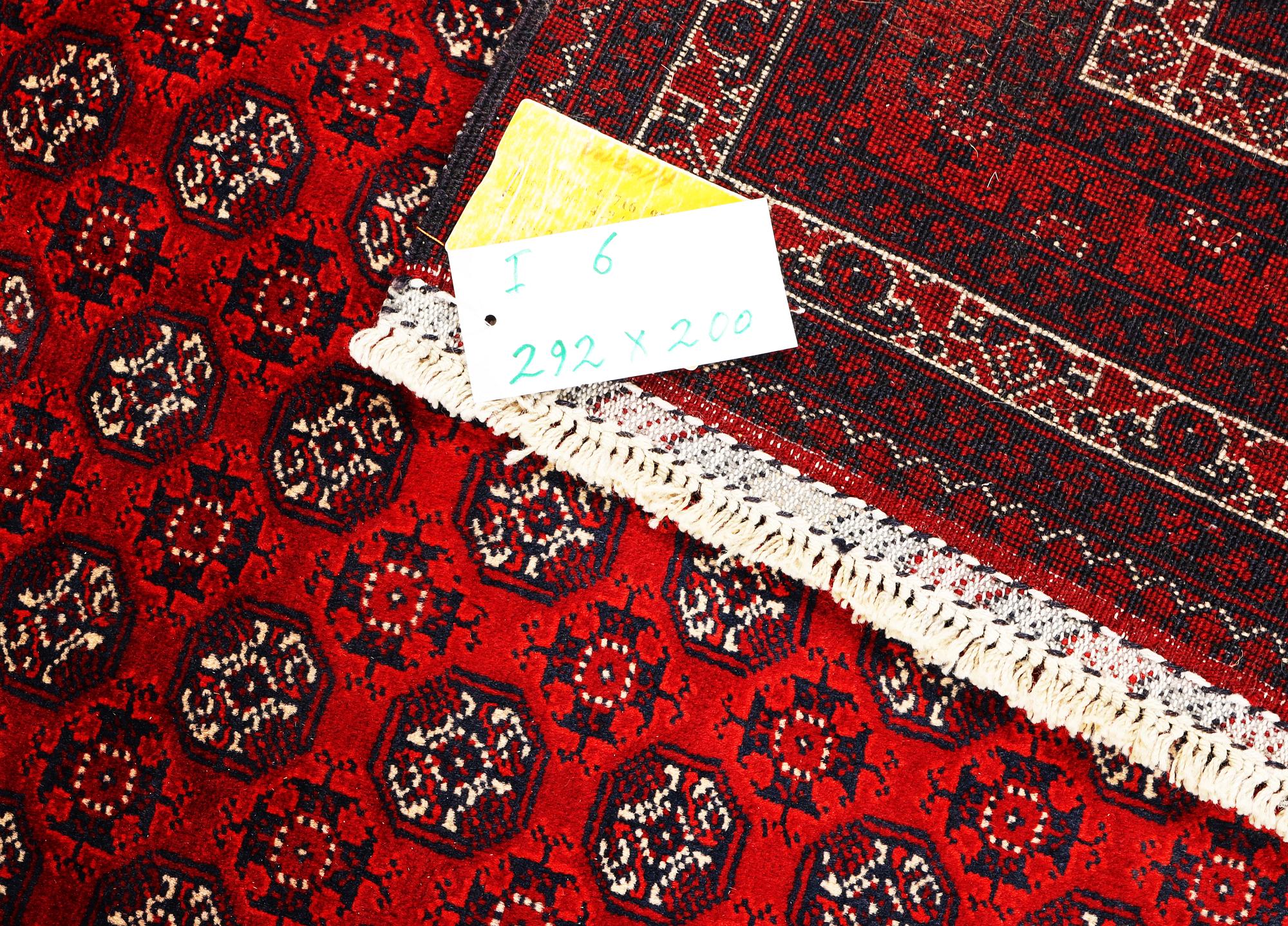 An Afghan carpet, c. 292 x 200 cm.