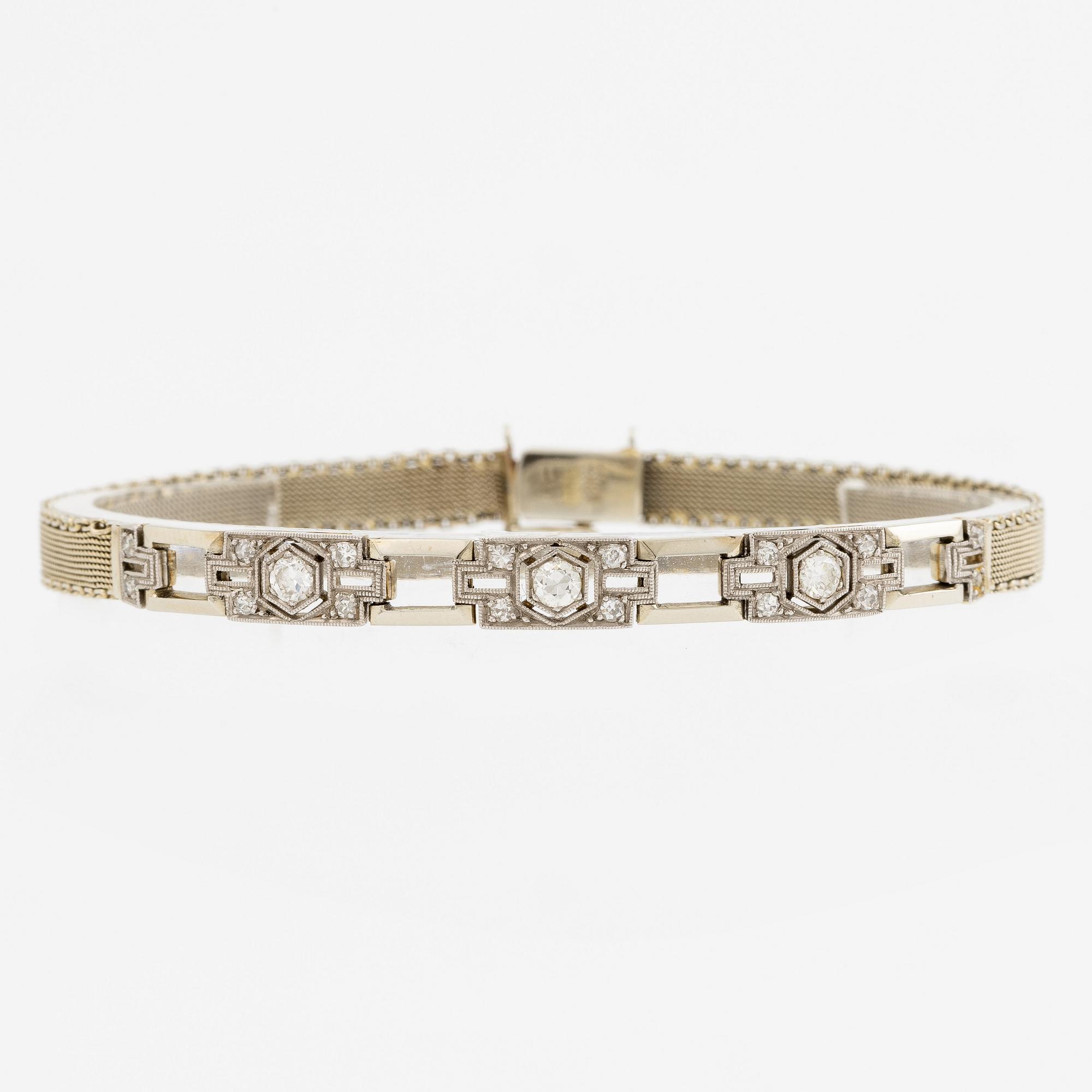 Arm bracelet, 18K white gold with brilliant-cut diamonds, old cut and octagonal-cut diamonds.