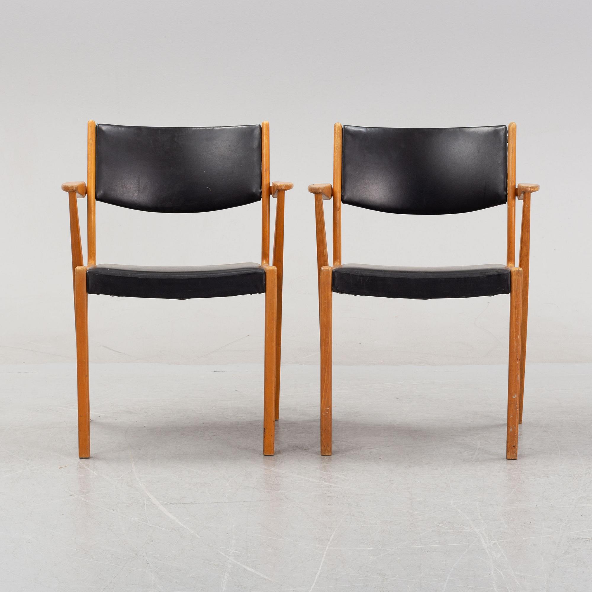 A pair of 1950's/60's armchairs.