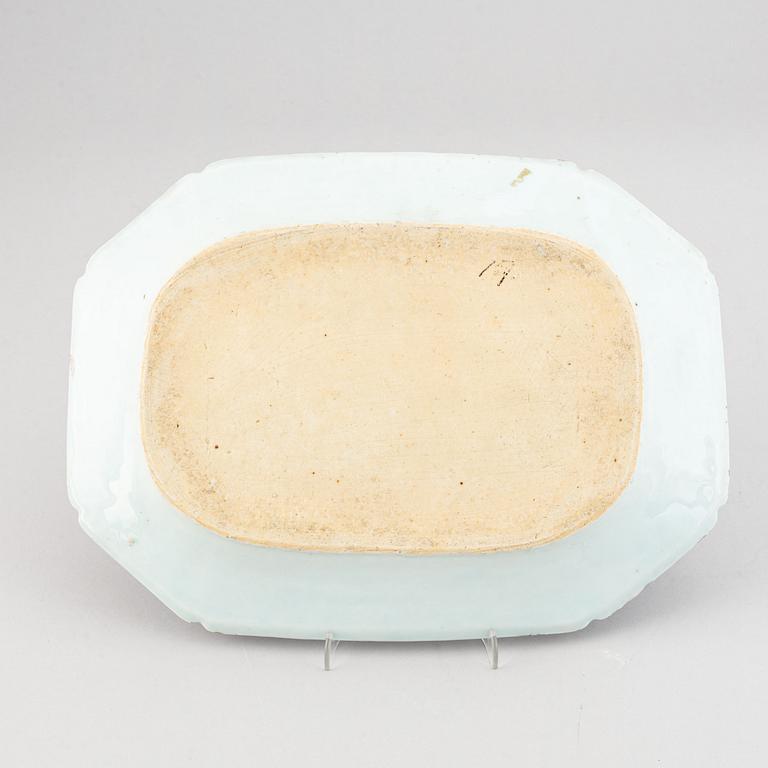 A set of two blue and white serving dishes, and two famille rose dinner plates, Qing dynasty, Qianlong (1736-95).