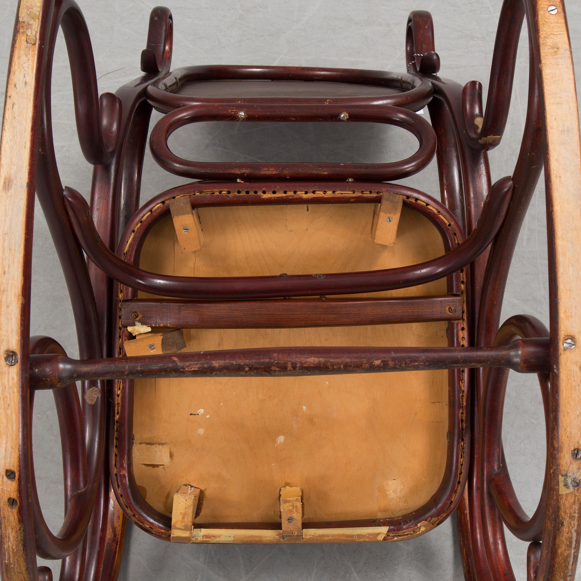 A stained rocking chair by Thonet, about 1900.