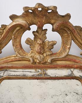 A Swedish Rococo mirror, 18 th century.